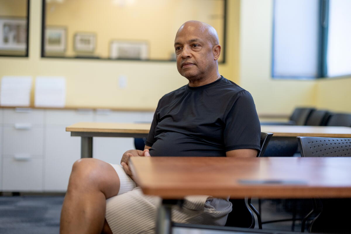 Marshall May, director of the Custody Program, poses for a photo
