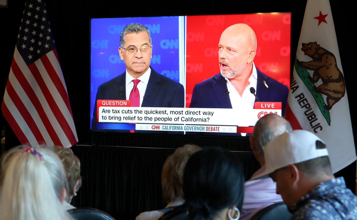 Audience members at Victorio's Ristorante in North Hollywood attend a CNN gubernatorial debate watch party