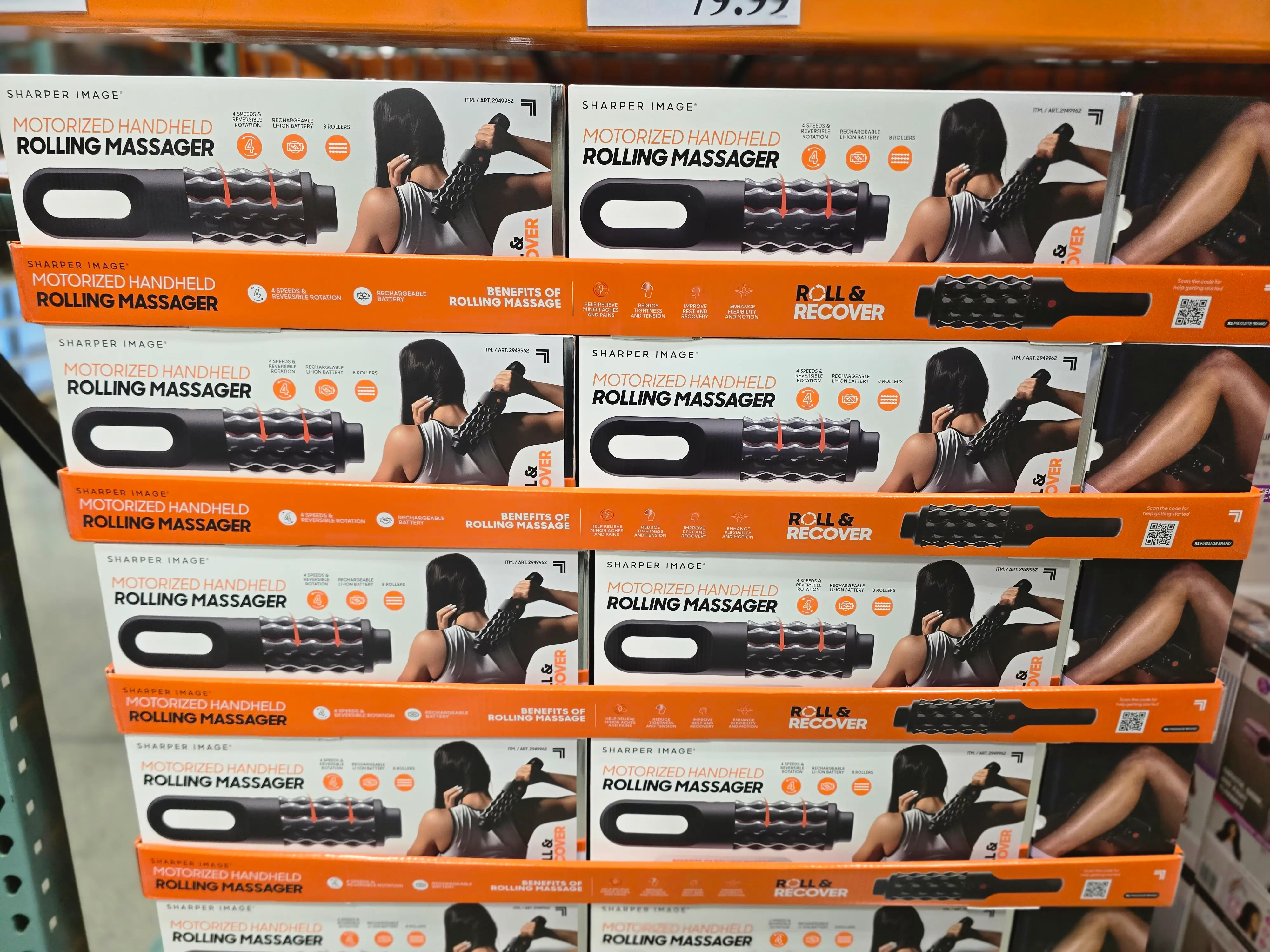 Kotak Sharper Image motorized handheld rolling massagers.