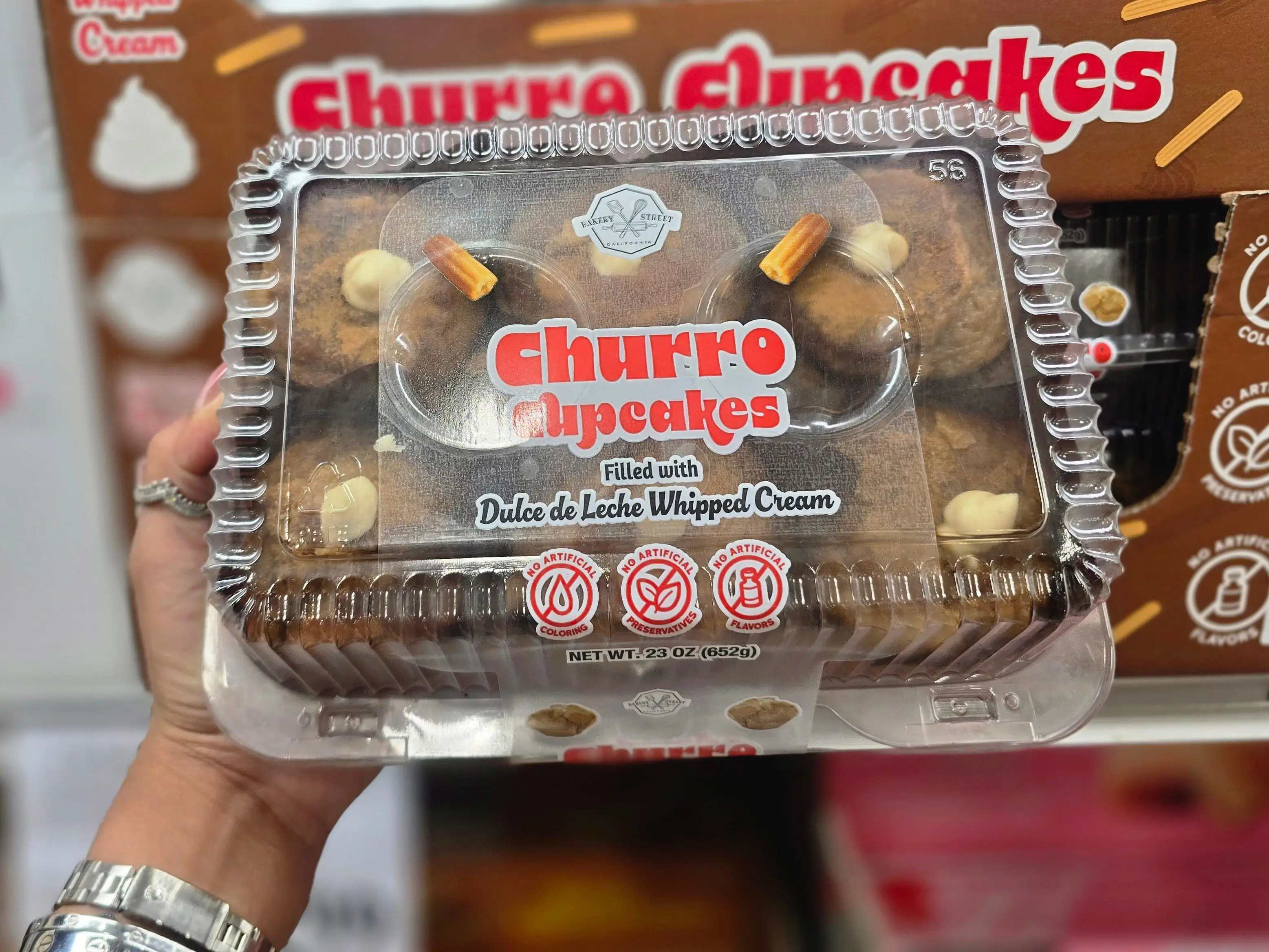 A container of Bakery Street churro cupcakes.