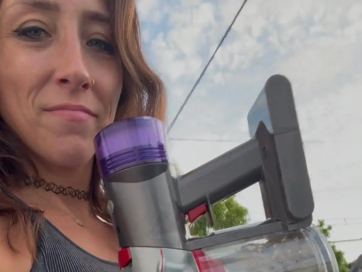 Woman with a vacuum