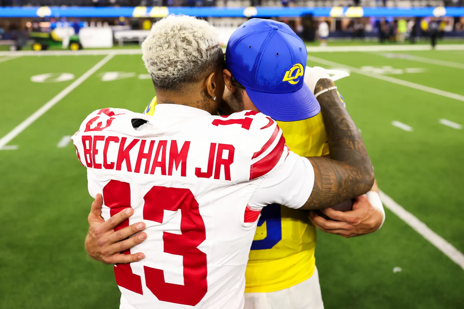 Odell Beckham Jr. #13 of the New York Giants shakes hands with Matthew Stafford #9 of the Los Angeles Rams