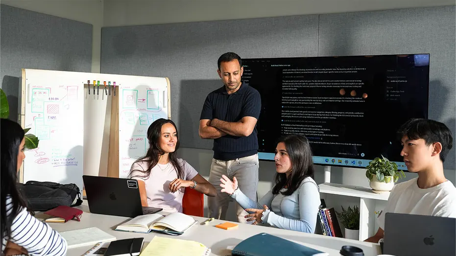 Gagan Biyani works with students during group sessions at Horowitz Andreessen Academy