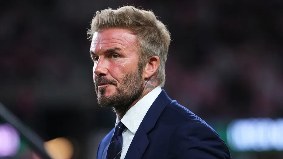 David Beckham looks on