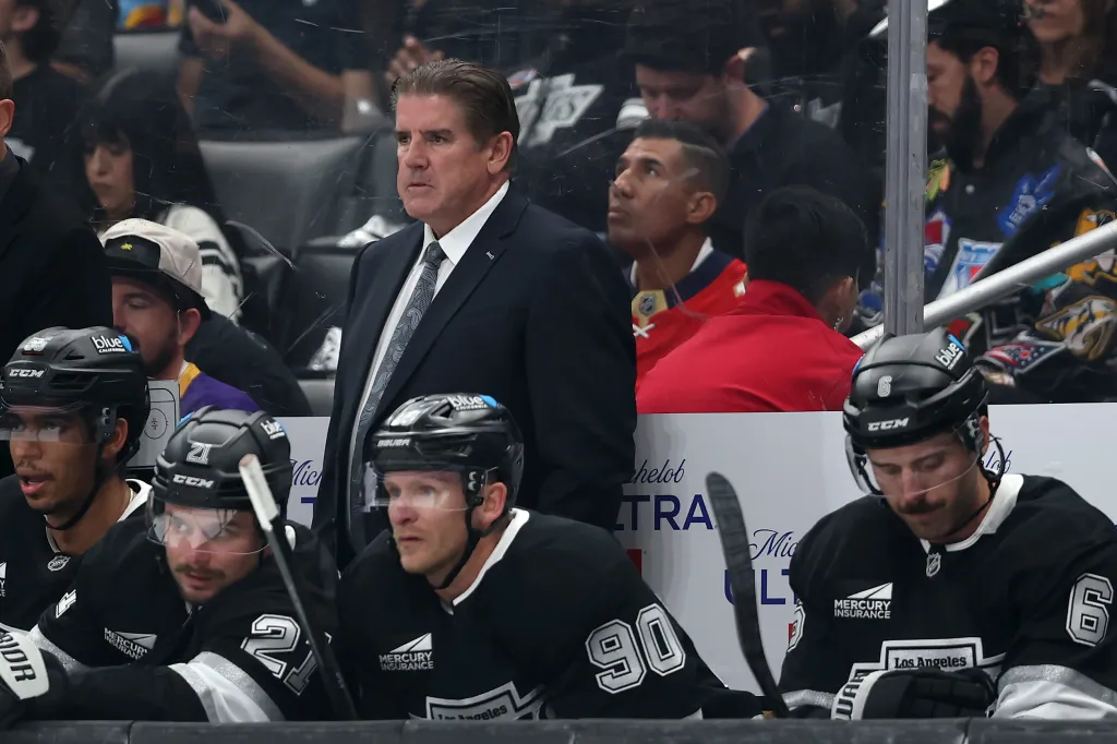 Los Angeles Kings head coach Peter Laviolette watches from the bench against the Florida Panthers.