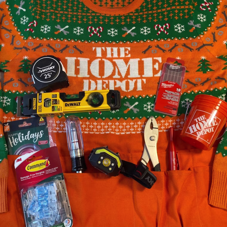 This sweater comes with a variety of tools perfect for hanging lights, art, and completing other home projects.
