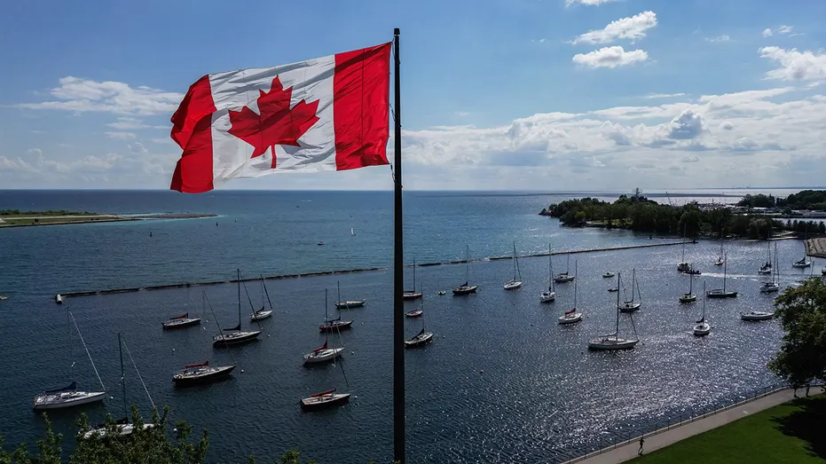 The Canadian flag flies